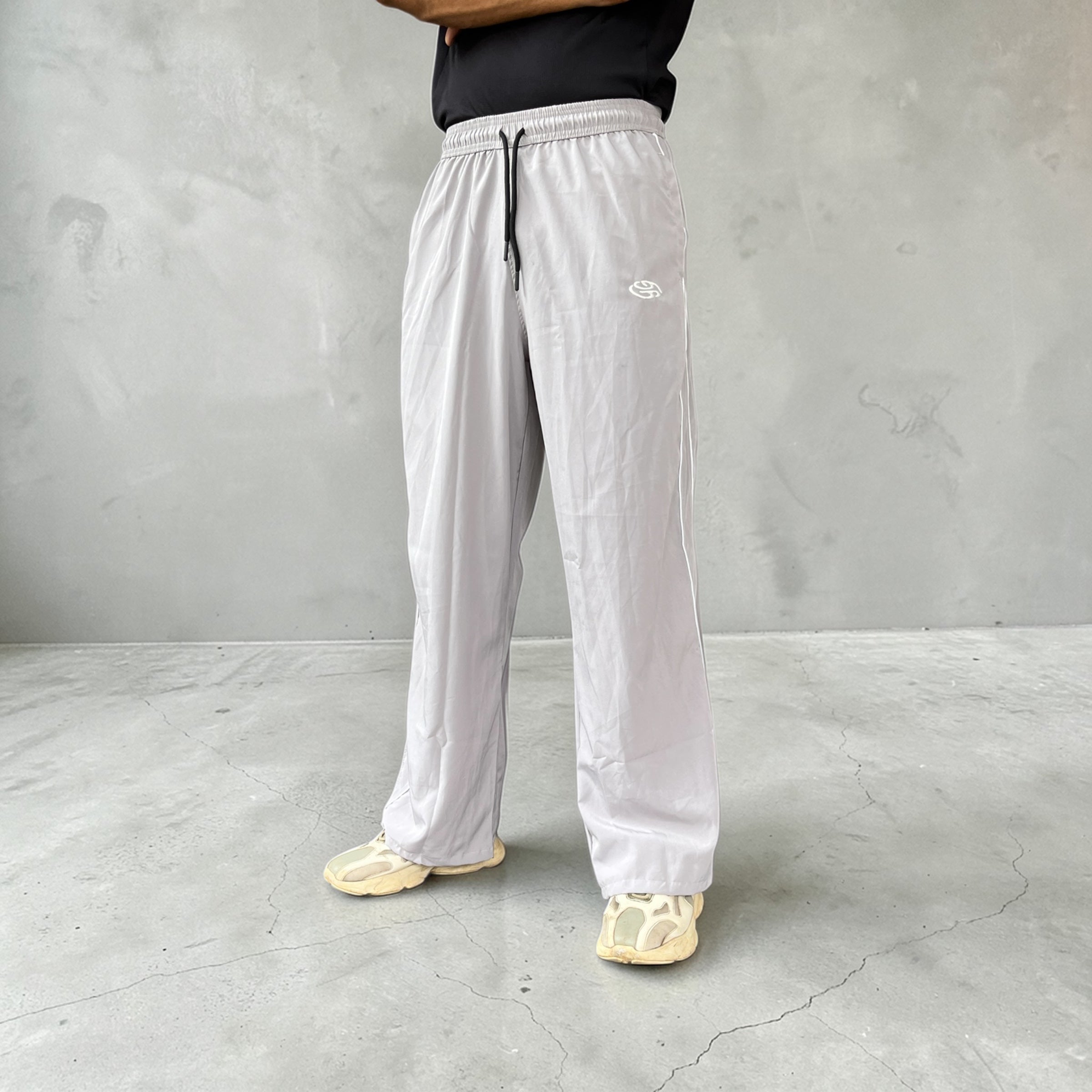 PIPING LOOSE FIT TRACK PANTS- LIGHT GREY