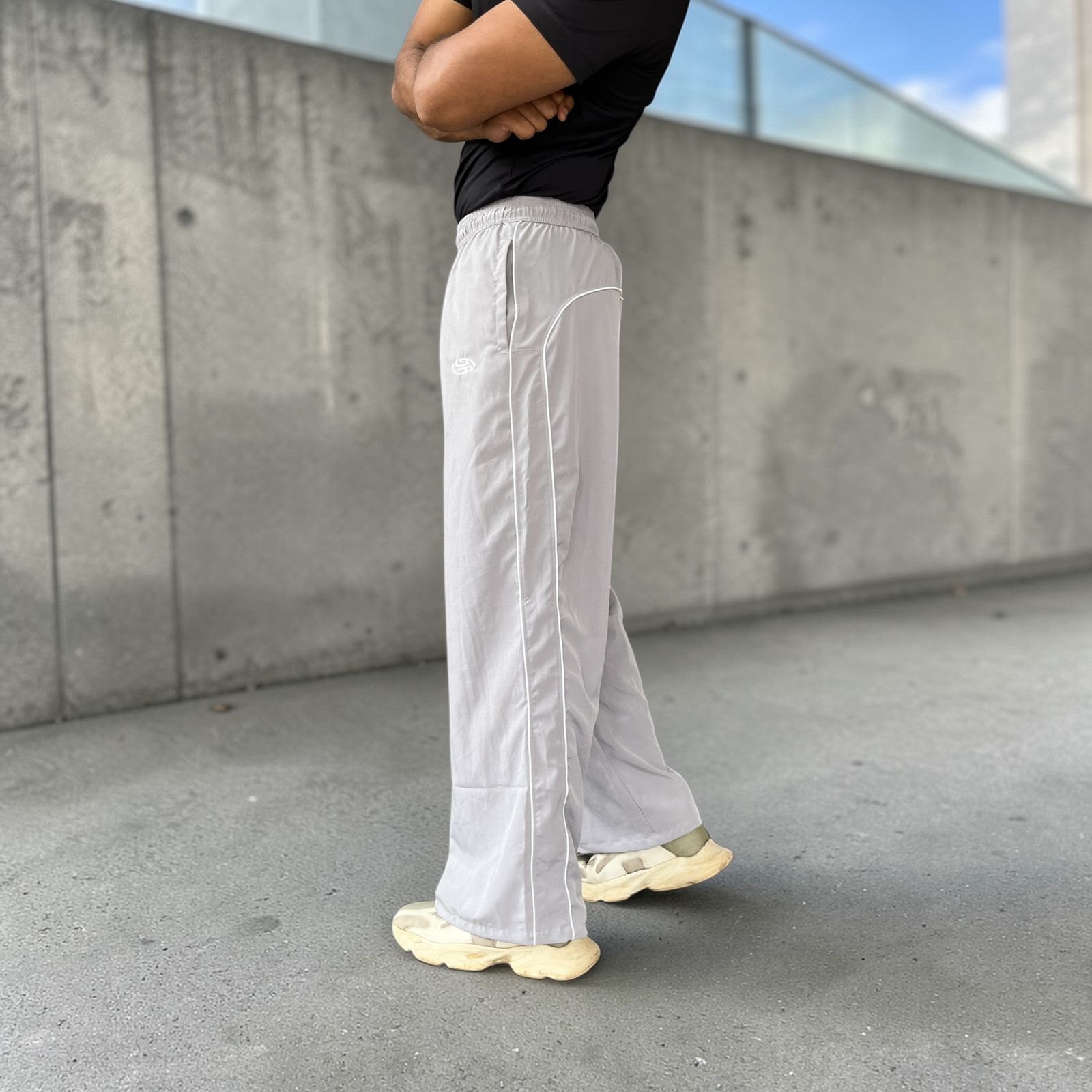 PIPING LOOSE FIT TRACK PANTS- LIGHT GREY