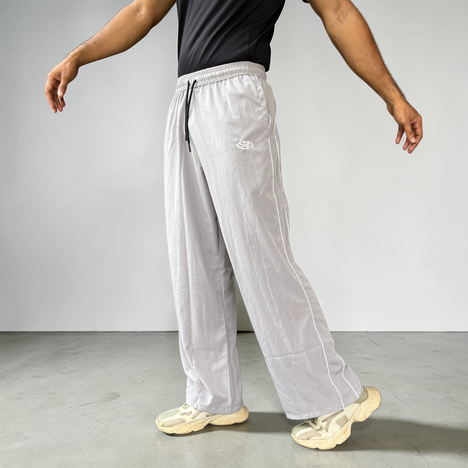 PIPING LOOSE FIT TRACK PANTS- LIGHT GREY